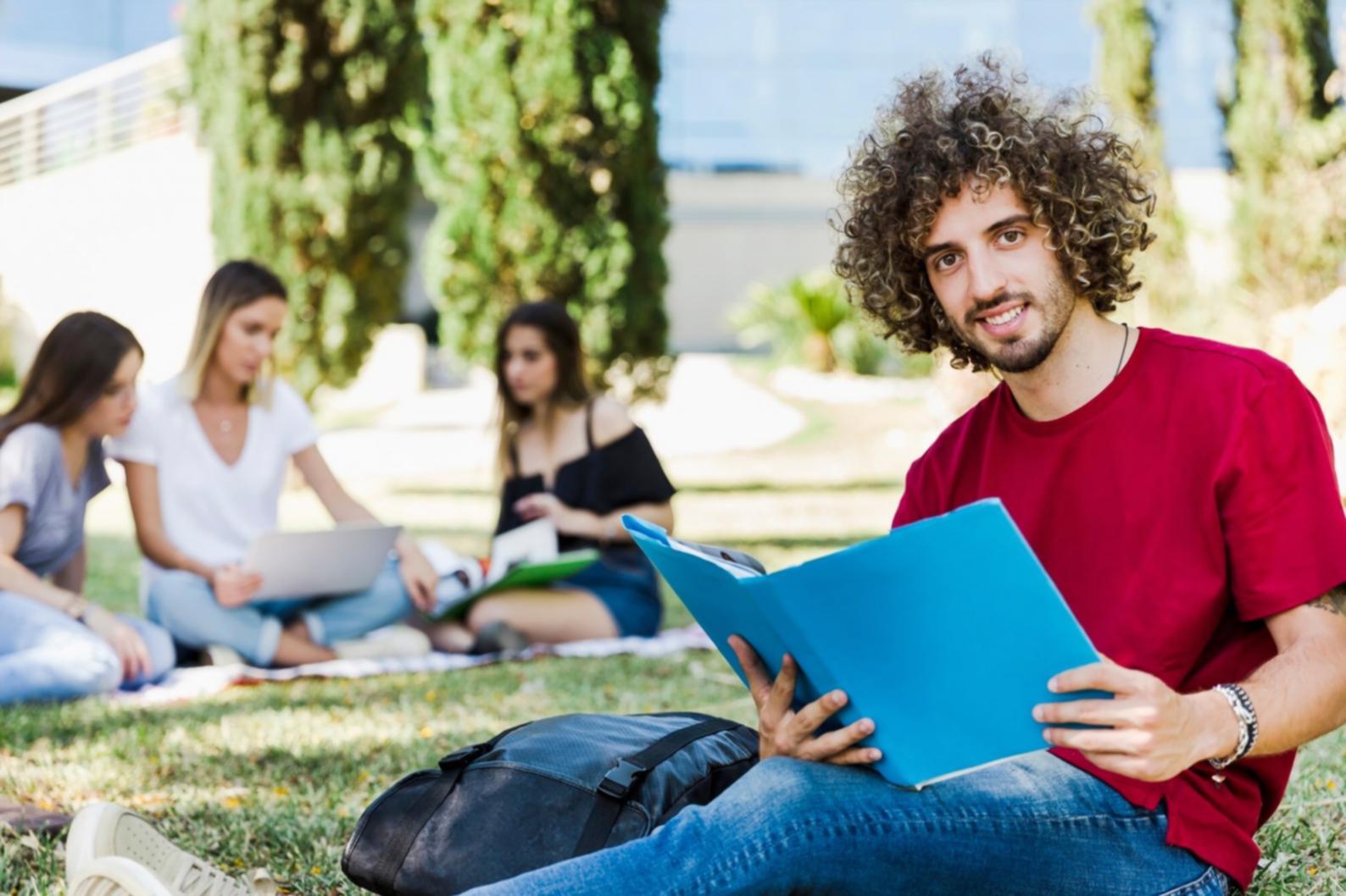 Person meditating in peaceful natural setting representing inner peace and self-development